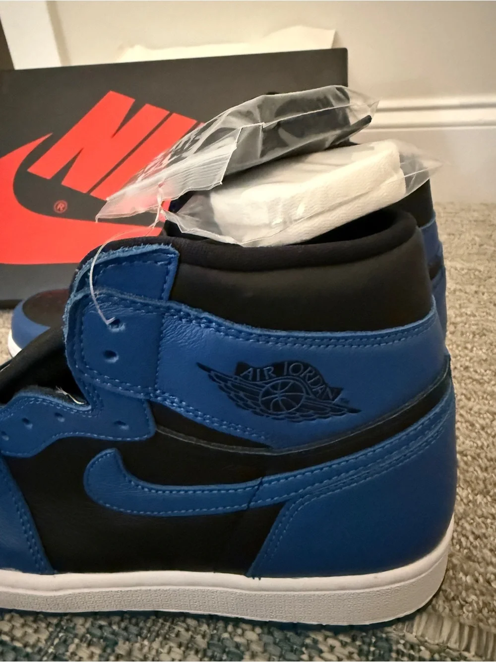 Nike Air Jordan 1 Mid in Black and Royal Blue